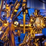 Researcher worikng at an ultrahigh vacuum chamber
