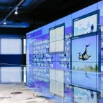 An interactive display area showing computer screens
