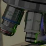 Close up of laboratory microscope lenses